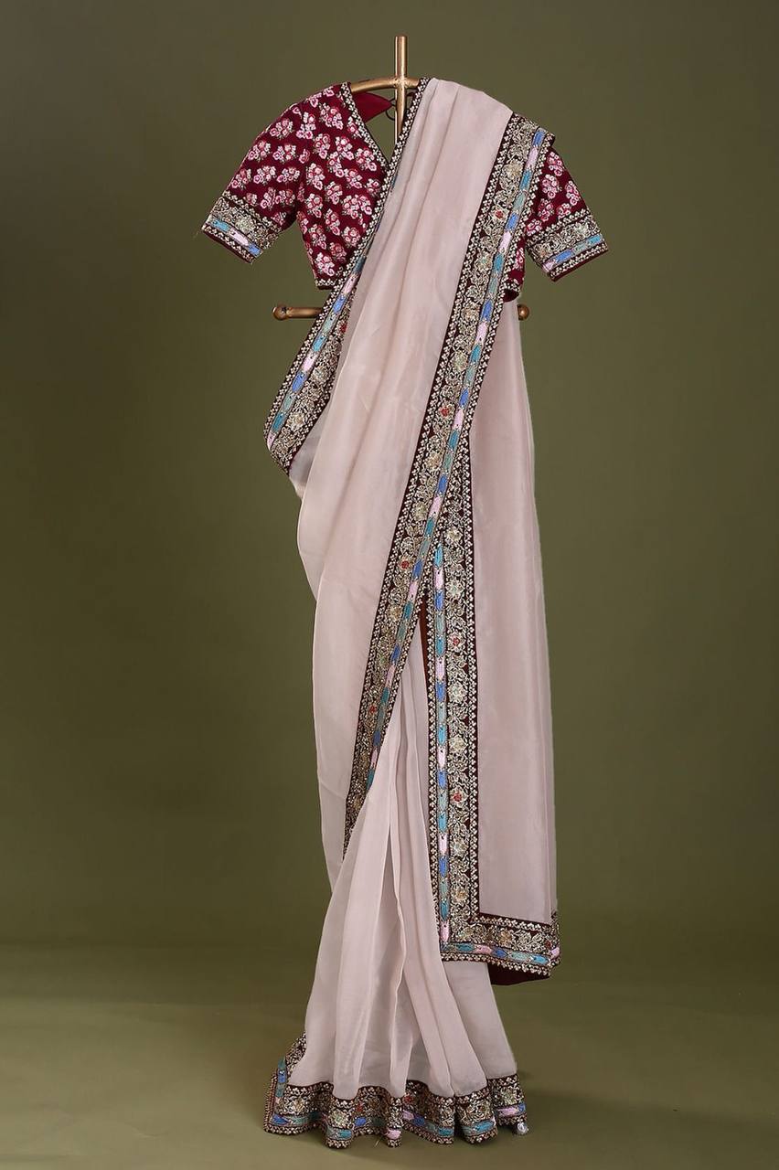 Exquisite Taby Organza Silk Cream Saree with Embroidery and Sequins Colorful Saree