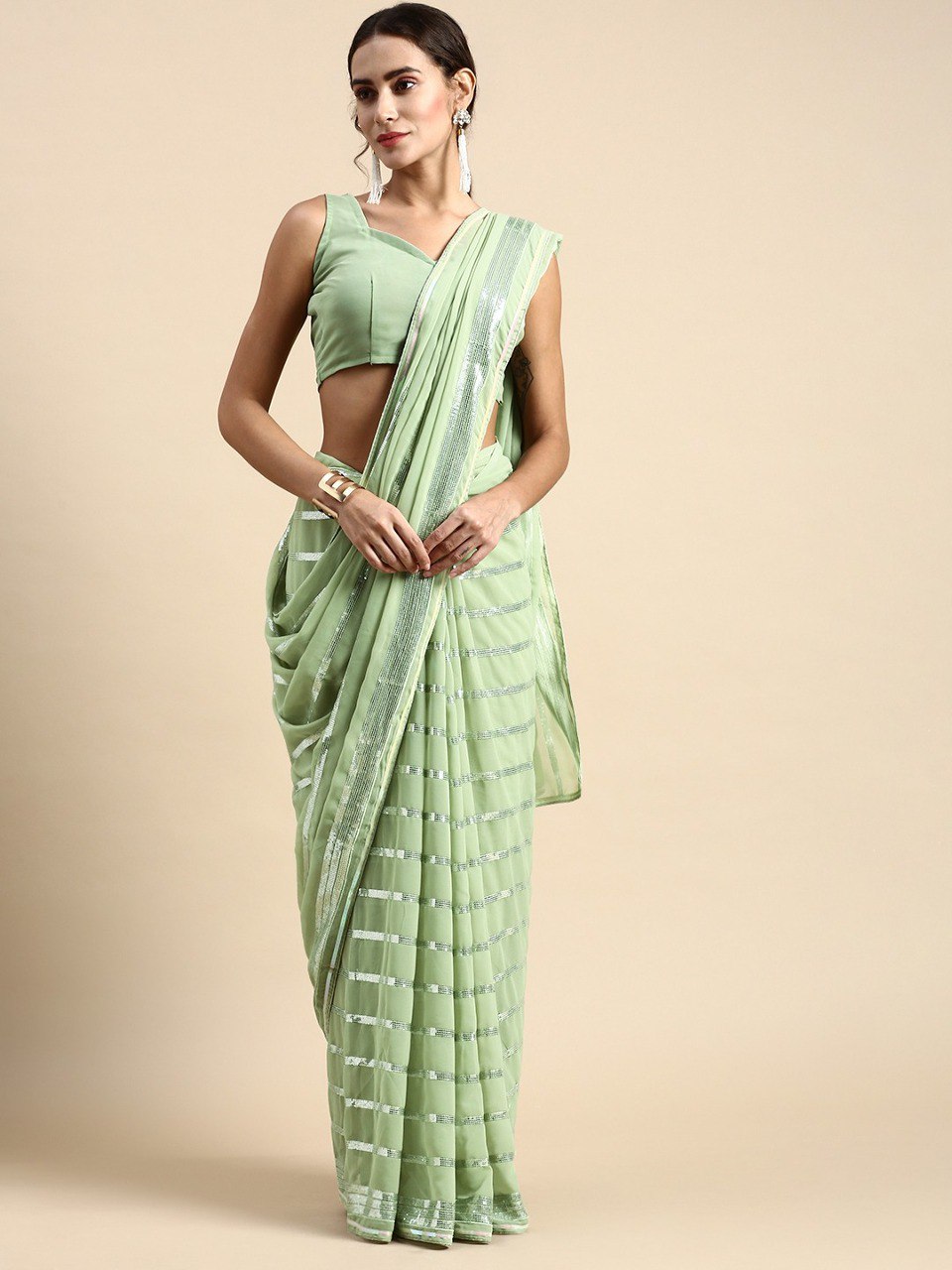 Glamorous Georgette Mint Green Saree with Sequined Design and Plain Blouse Piece Colorful Saree