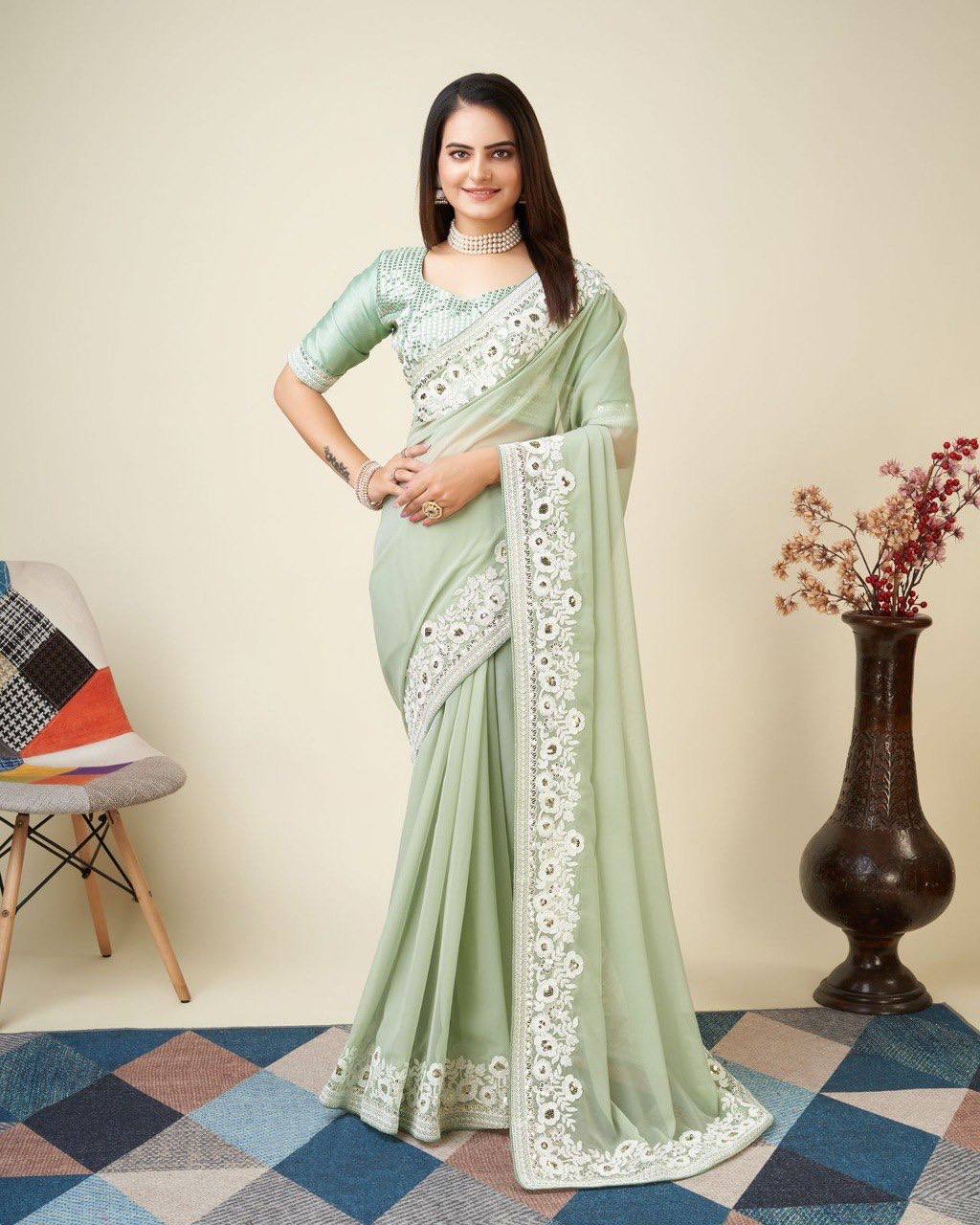 Stunning Faux Georgette Mint Green Saree with Embroidered C-Pallu and Blouse Colorful Saree