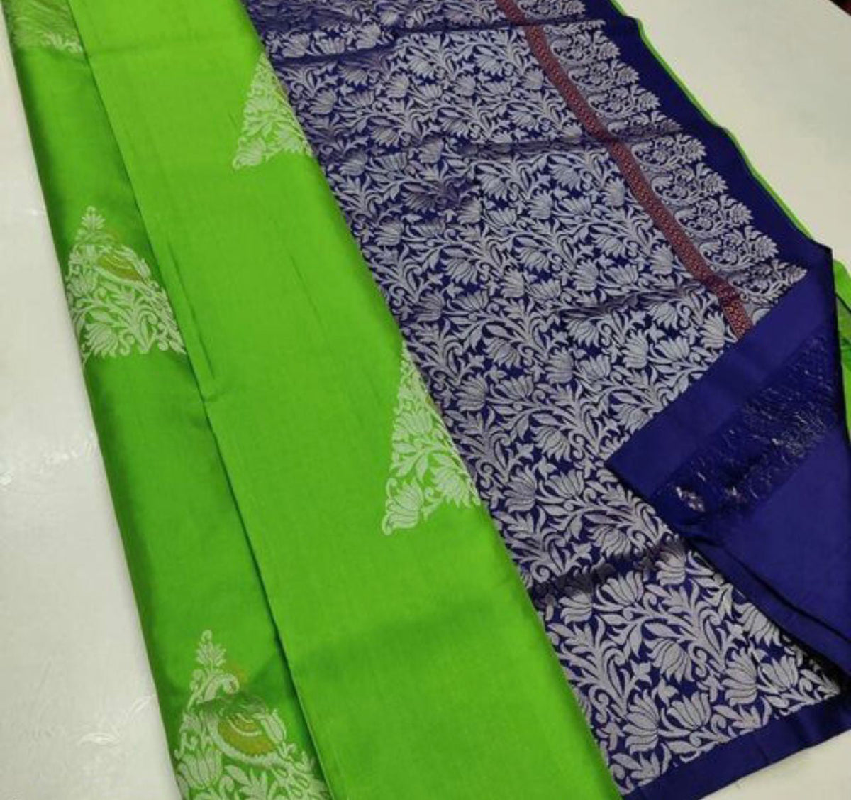 Sophisticated Parrot Soft Silk Saree With Gleaming Blouse Piece - Colorful Saree