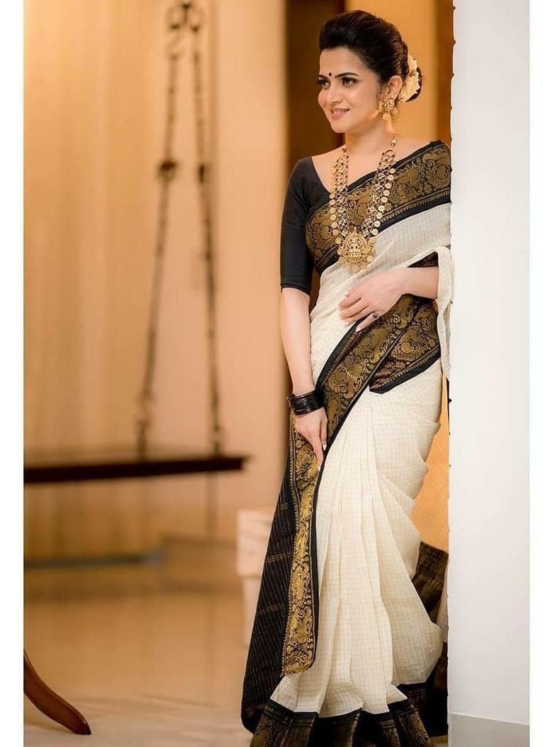 Twirling Off White Soft Banarasi Silk Saree With Panoply Blouse Piece - Colorful Saree